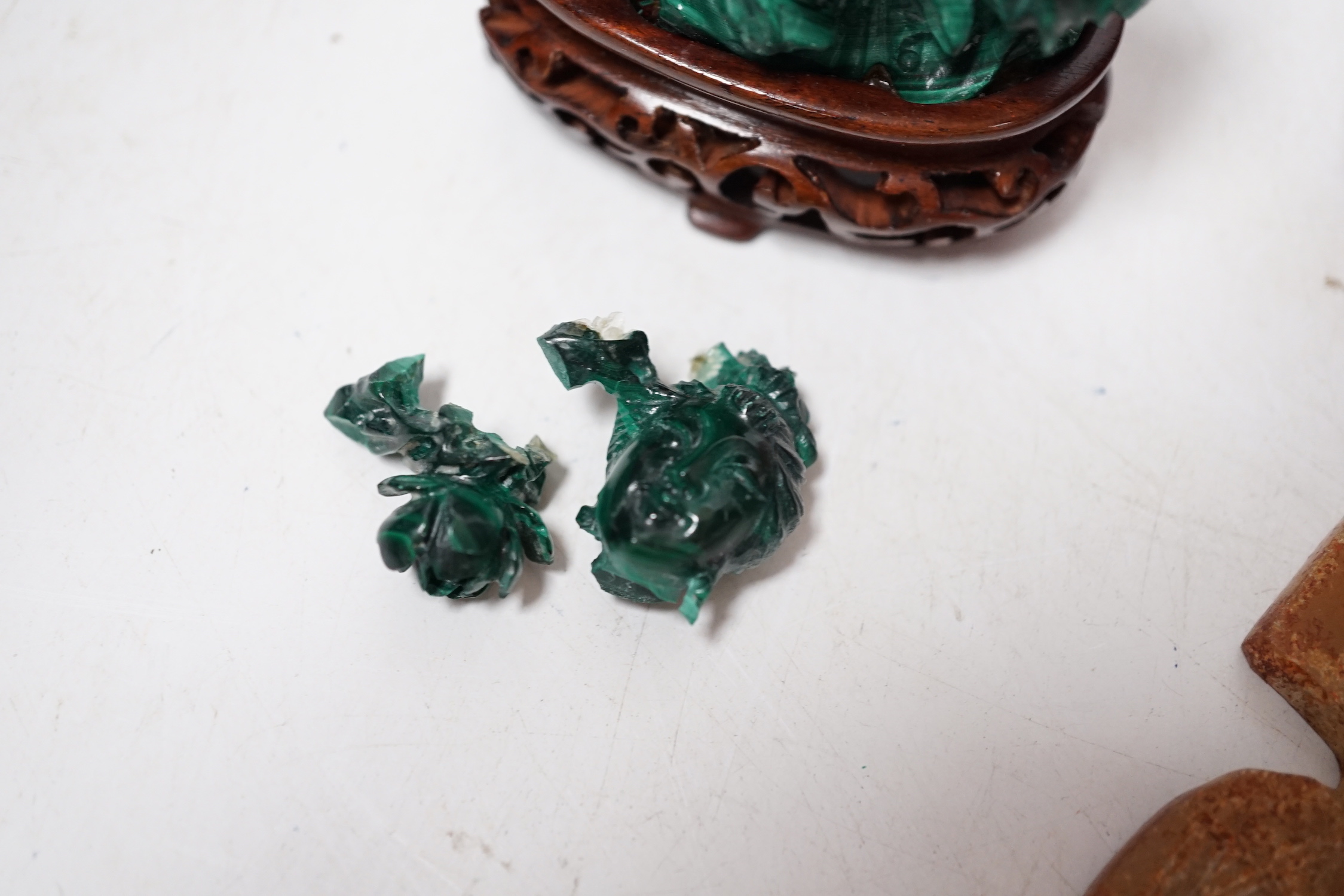 A group of Chinese hardstone carvings and a soapstone cong, largest 10.5cm